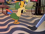 José dances on Rio's mosaic sidewalks as they are painted by the artist.