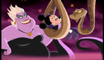 Ursula and Kaa have Minnie all wrapped up.