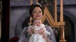 Cora holds baby Regina