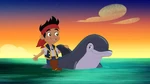 Jake mounted on Flow the Dolphin