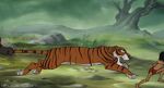 Shere Khan chases Mowgli