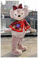 ShellieMay the Disney Bear posing for a photo at American Waterfront at Tokyo DisneySea in her Cape Cod Carolers outfit.