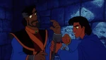 Cassim surprised when Aladdin arrives to help him escape.
