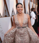 Gina Rodriguez arrives at the 90th annual Academy Awards in March 2018.