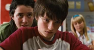 Bridge-to-terabithia-disneyscreencaps.com-663.jpg (141 KB) Scott taunts Jess for wearing his sister's hand-me-down sneakers.