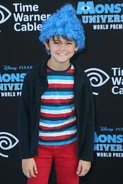 Max Charles MU premiere.jpg (109 KB) Max Charles wearing a blue wig at the premiere of Monsters University in June 2013.