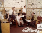 Davis attending a story meeting for Sleeping Beauty with Eric Larson, Joe Rinaldi, and Don DaGradi.