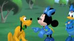 Pluto telling Minnie about Mickey, who was shrunk by Megamort