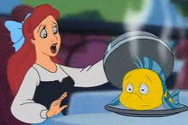 A Ariel le sirven a Flounder.