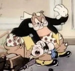 Adelbert siendo azotado en el trasero por su padre.