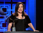 Jennifer Tilly speaks onstage at the 2014 Writers' Guild Awards.