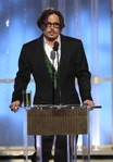 Johnny Depp speaks onstage at the 69th annual Golden Globes in January 2012.
