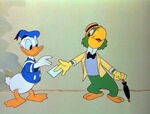 José giving his business card to Donald.