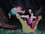 Hook about to get accidentally whacked by Smee