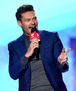 Ryan Seacrest speaks onstage at the 2018 iHeartRadio Music Fest.