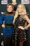 Carrie Underwood and Kelly Clarkson attending the 2018 Radio Disney Music Awards.