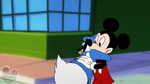 Mickey hugs Donald crying