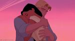 Pocahontas and John embrace after Pocahontas convince her father to spare John