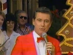 Regis Philbin hosting the Disney Christmas parade.