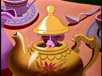 The Doormouse sleeps in the teapot