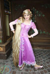 Rapunzel posing for a photo at the Fantasyland Book Shoppe at Hong Kong Disneyland