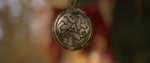 Merida's Pendant with the main symbol of DunBroch