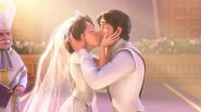 Eugene and Rapunzel share their first kiss as newlyweds