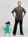 Baker standing next to Perry the Platypus.