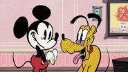 Smiling mickey and pluto