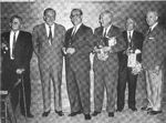 Photo from the October 1963 party in the Penthouse Club at the Disney Studio where Mousecars and Ducksters were presented to Disney comic strip writers and artists (left to right: Bob Karp, Walt Disney, Floyd Gottfredson, Al Taliaferro, Manuel Gonzales and Roy O. Disney).