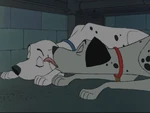 Perdita sobbing and Pongo comforting her.