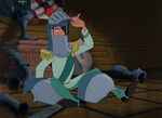 The Duke wearing a knight's helmet.