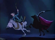 Ichabod clings desperately to the neck of Gunpowder as they race along for their dear life.