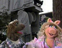 Miss Piggy and Beauregard exit Star Tours.