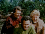 Robin and the others laughing at Allan-a-Dale's singing