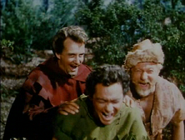 Little John and the others laughing at Allan-a-Dale's singing