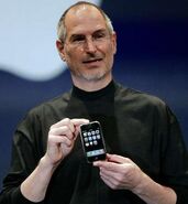 Steve Jobs presenting an iPhone at the 2010 Worldwide Developers Conference.
