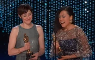 Domee Shi and Becky Neiman-Cobb accepting the Oscar for Best Animated Short film for Bao.