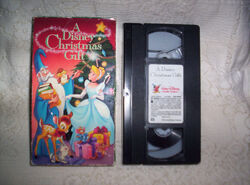 https://static.wikia.nocookie.net/disney/images/d/dd/A_Disney_Christmas_Tape_VHS_Tape.JPG/revision/latest/scale-to-width-down/250?cb=20140903011015