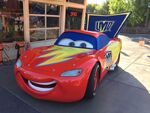 Lightning McQueen dressed as a superhero during Halloween Time