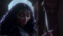 Mother Gothel holding her dagger after she stabs Eugene.