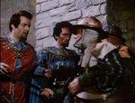 Robin, disguised as one of Prince John's guards, forcing Prince John and the Sheriff at knife point to take them to Maid Marian