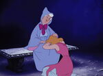 Fairy Godmother comforts her.