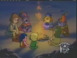 Cavin With the Gummi Bears at a campfire at night