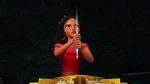 Elena holds the wand that killed her parents