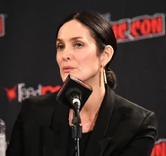 Carrie-Anne Moss speaks at the 2019 New York Comic Con.