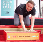 Billy Crystal poses at his Chinese Theatre Handprint ceremony in April 2019.