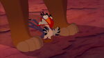 Zazu cringed at the sound of Scar's claw to rock