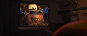 Mater talking to McQueen through his iPad.