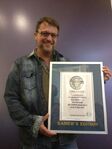 Steve Blum receiving a Guinness World Record for the most appearances in video games.